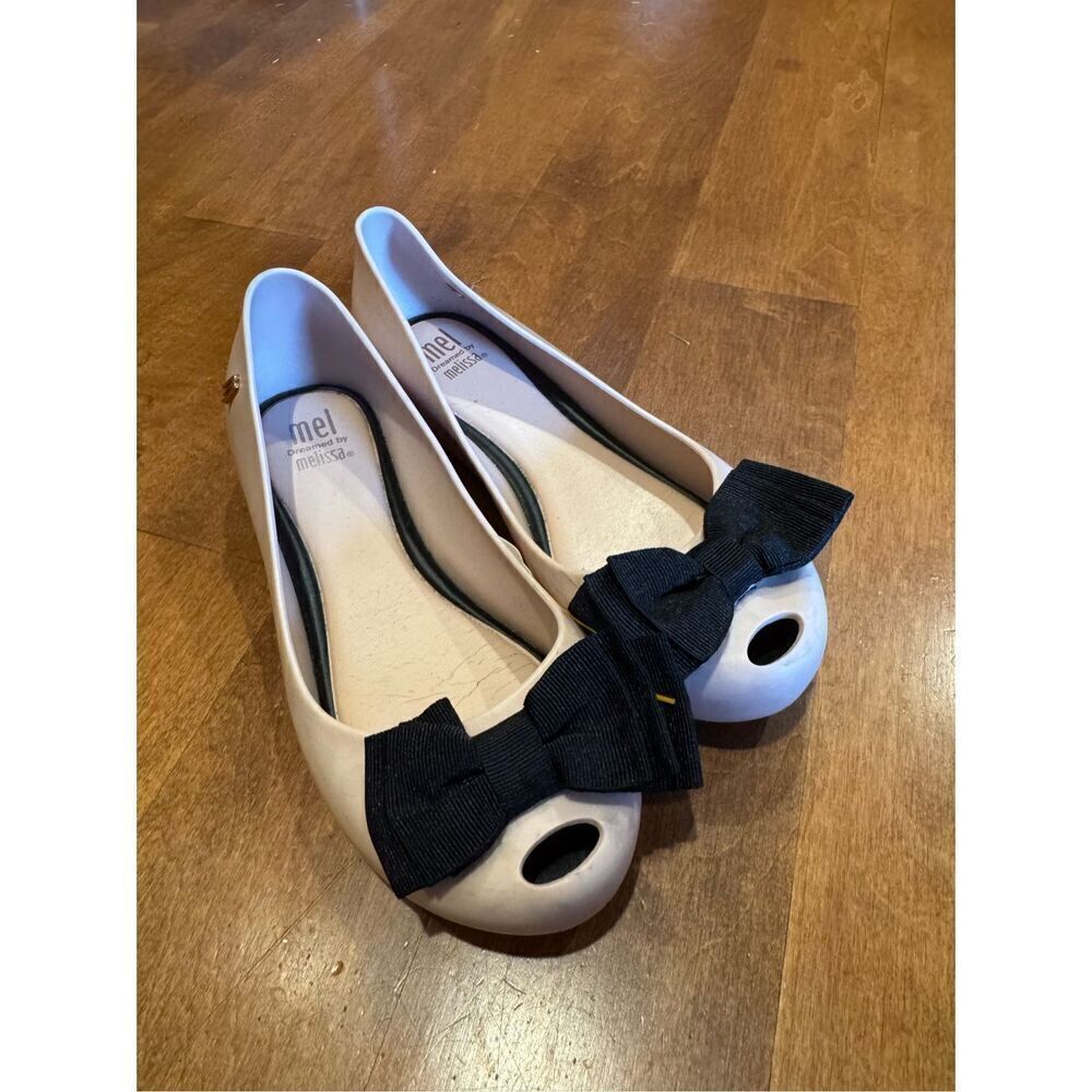 Little girl size one Melissa flats size one